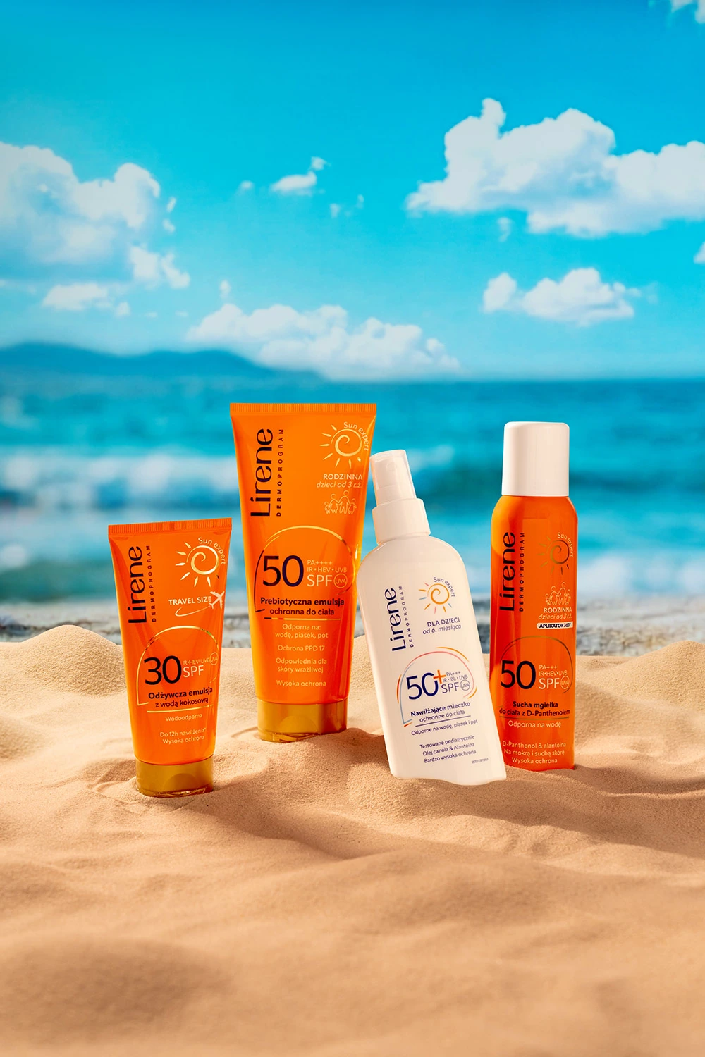 Key visual kampanii Lirene Sun — spray SPF 30 na piasku, w tle morze. Kreacja wykorzystana na plakatach i citylightach przystankowych.
